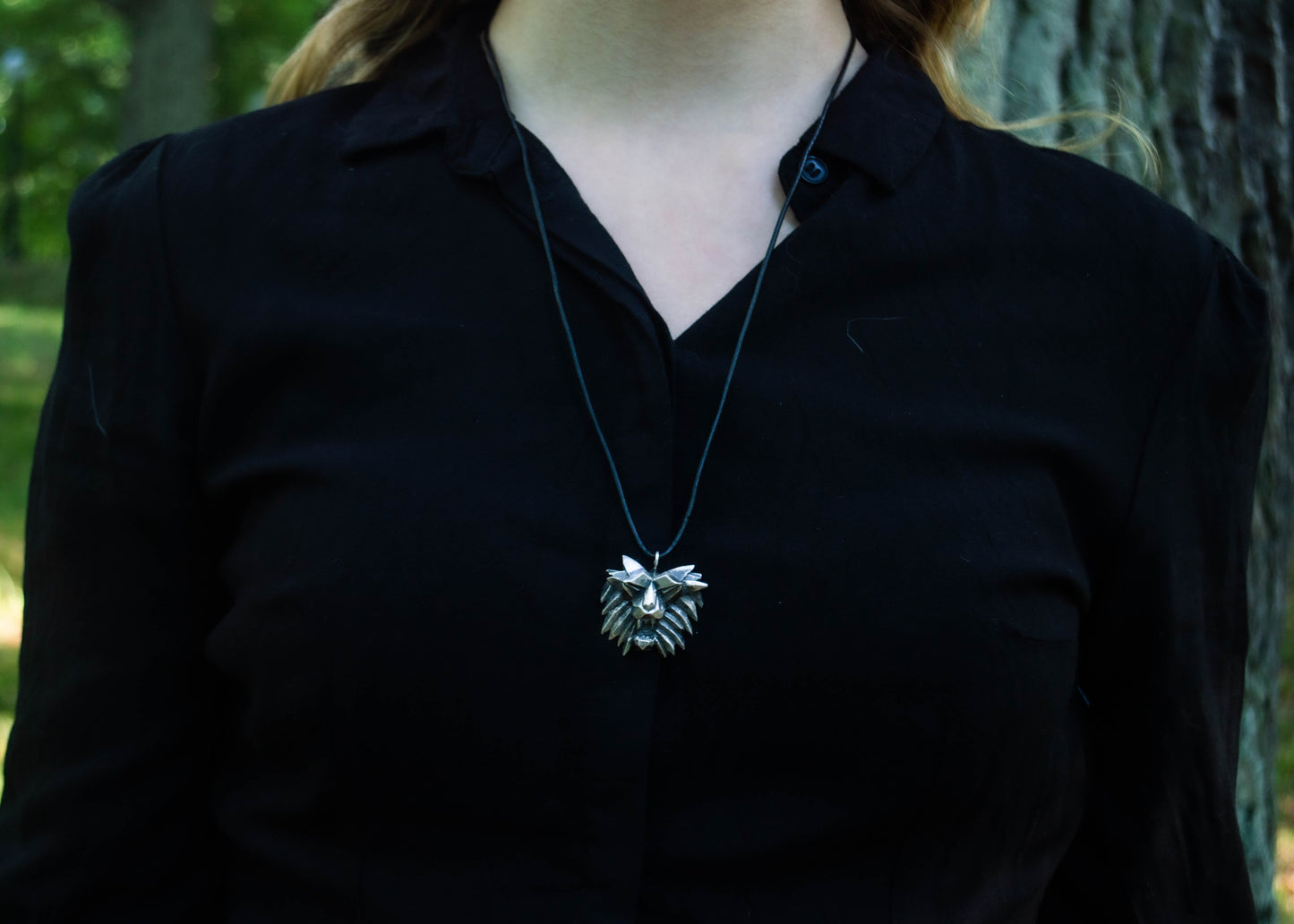 Hõbedast ripats lõviga