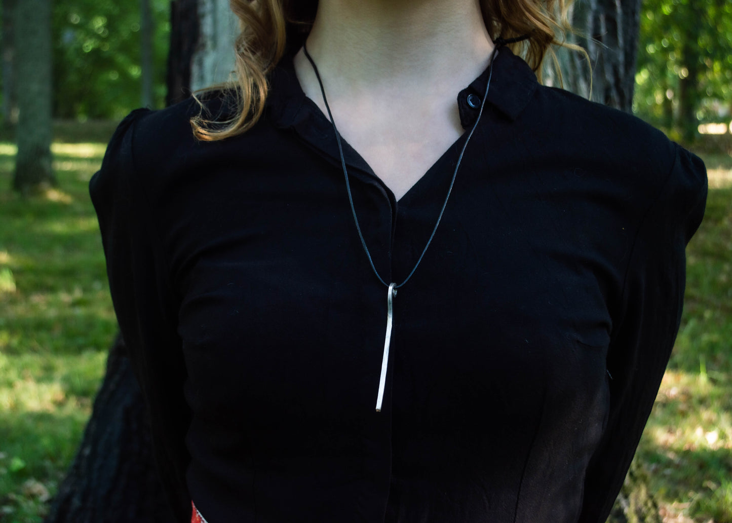 Forged silver pendant