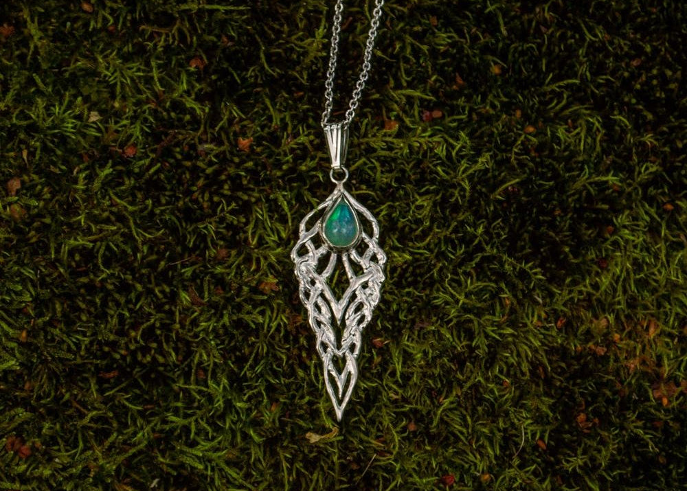 Fantasy style silver pendant with opal