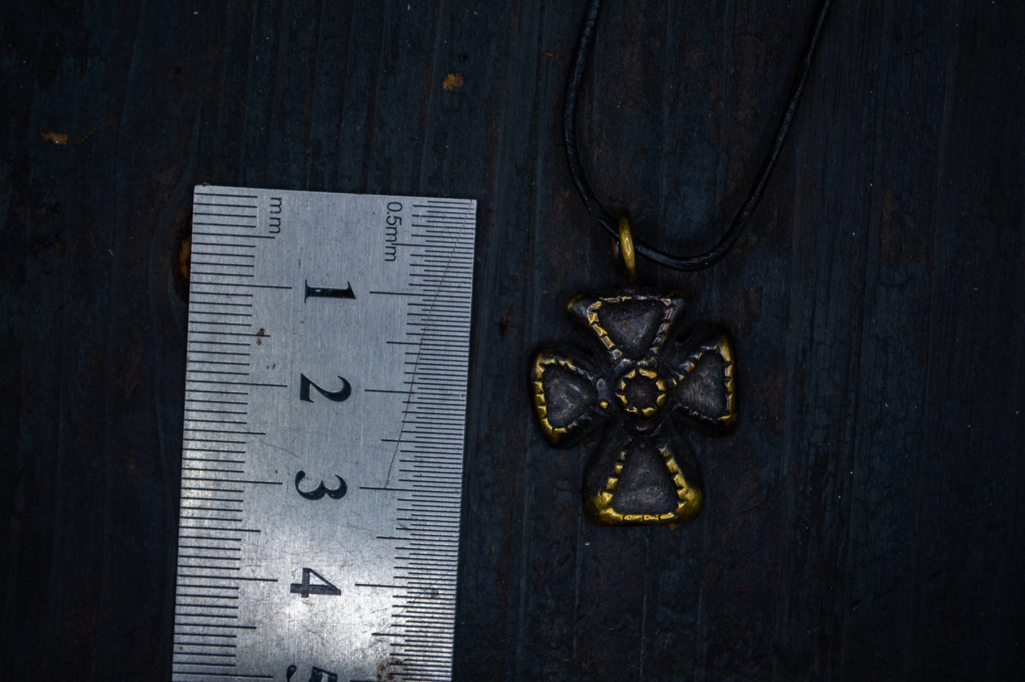 Brass pendant with a cross