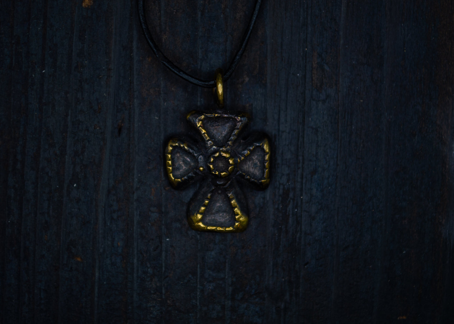 Brass pendant with a cross