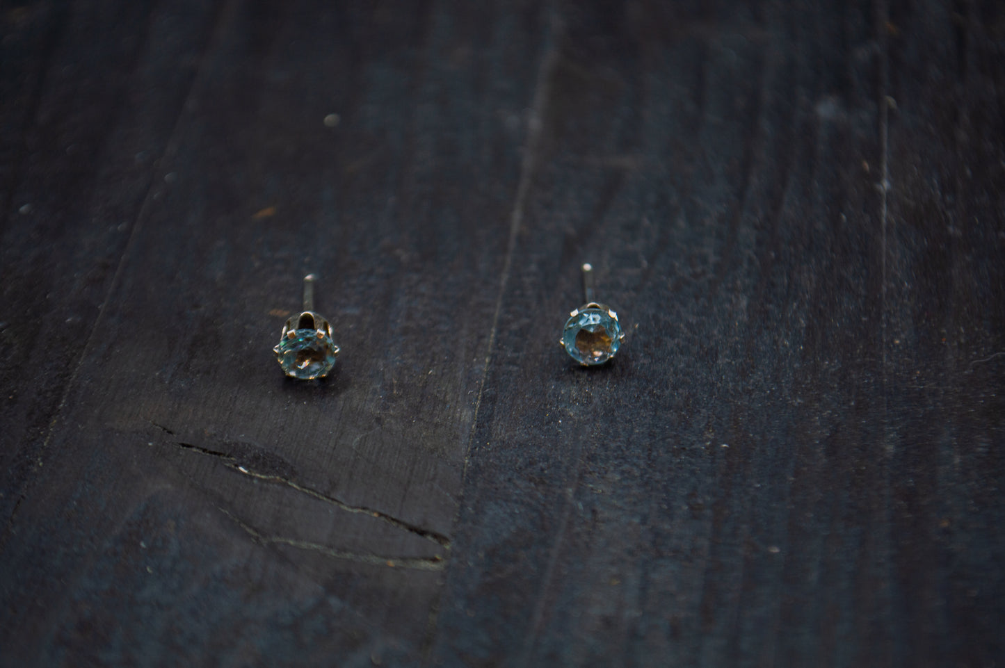 Silver earrings with blue topaz