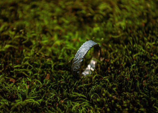 Dark silver ring with unique pattern
