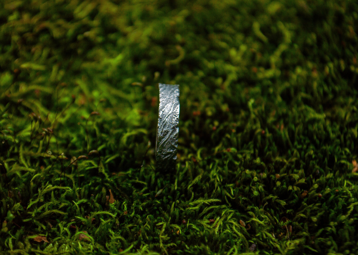 Dark silver ring with unique pattern