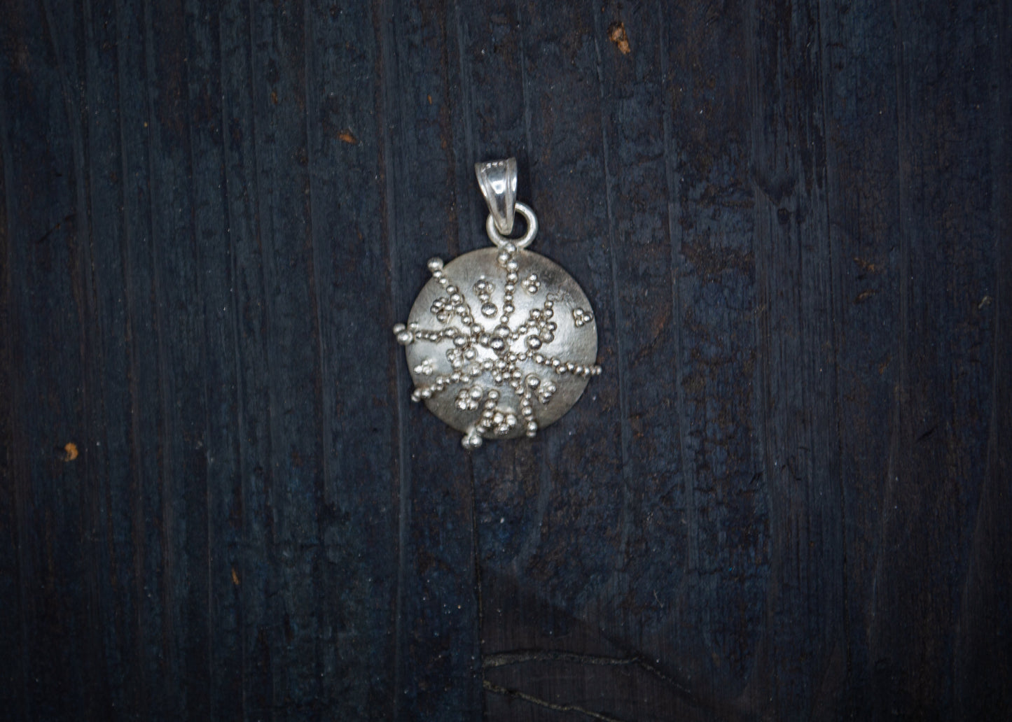 Silver pendant with filigree and granulation