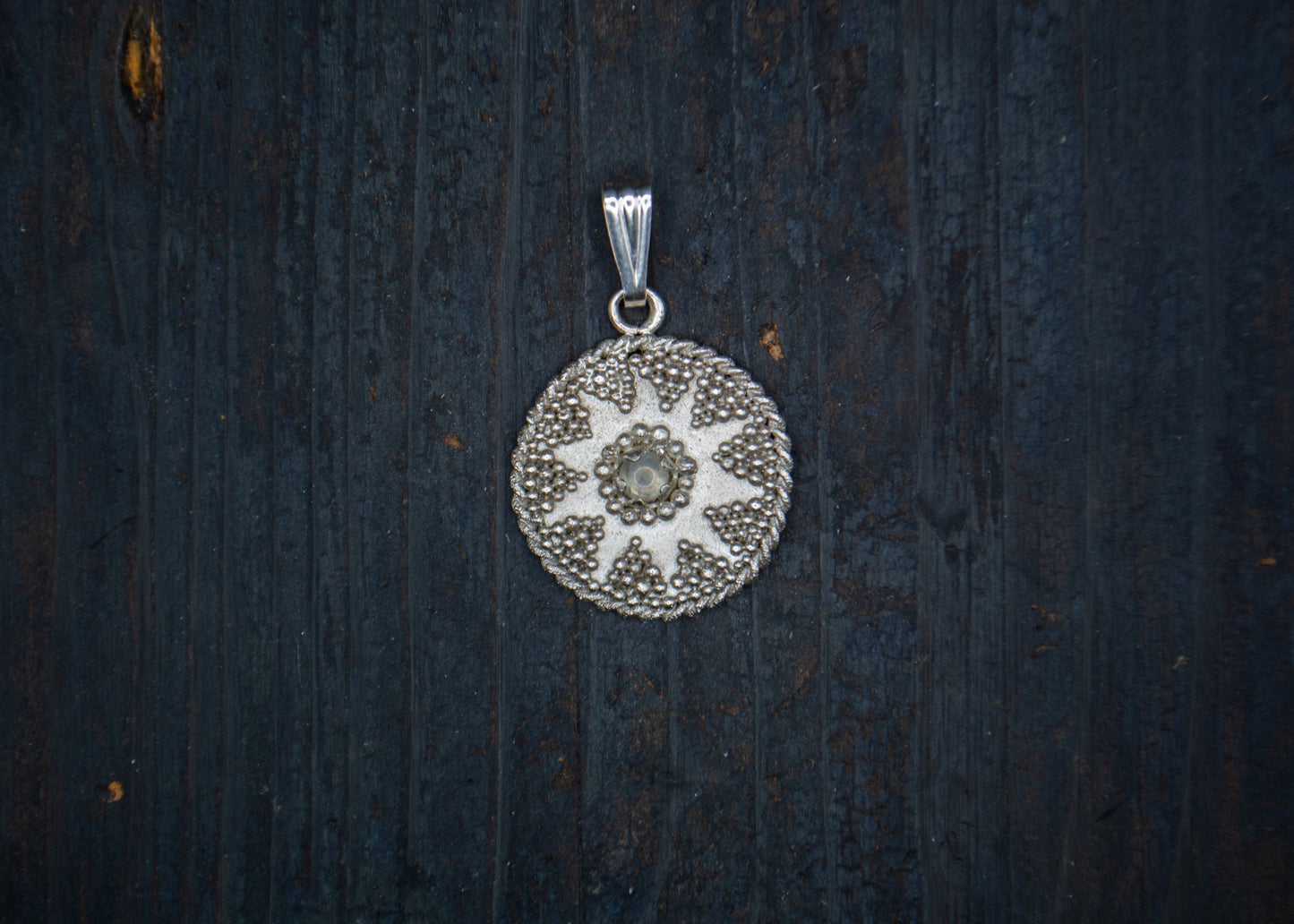 Silver pendant with filigree, granulation and moonstone