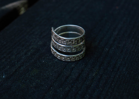 Silver spiral ring with traditional Estonian viking age pattern