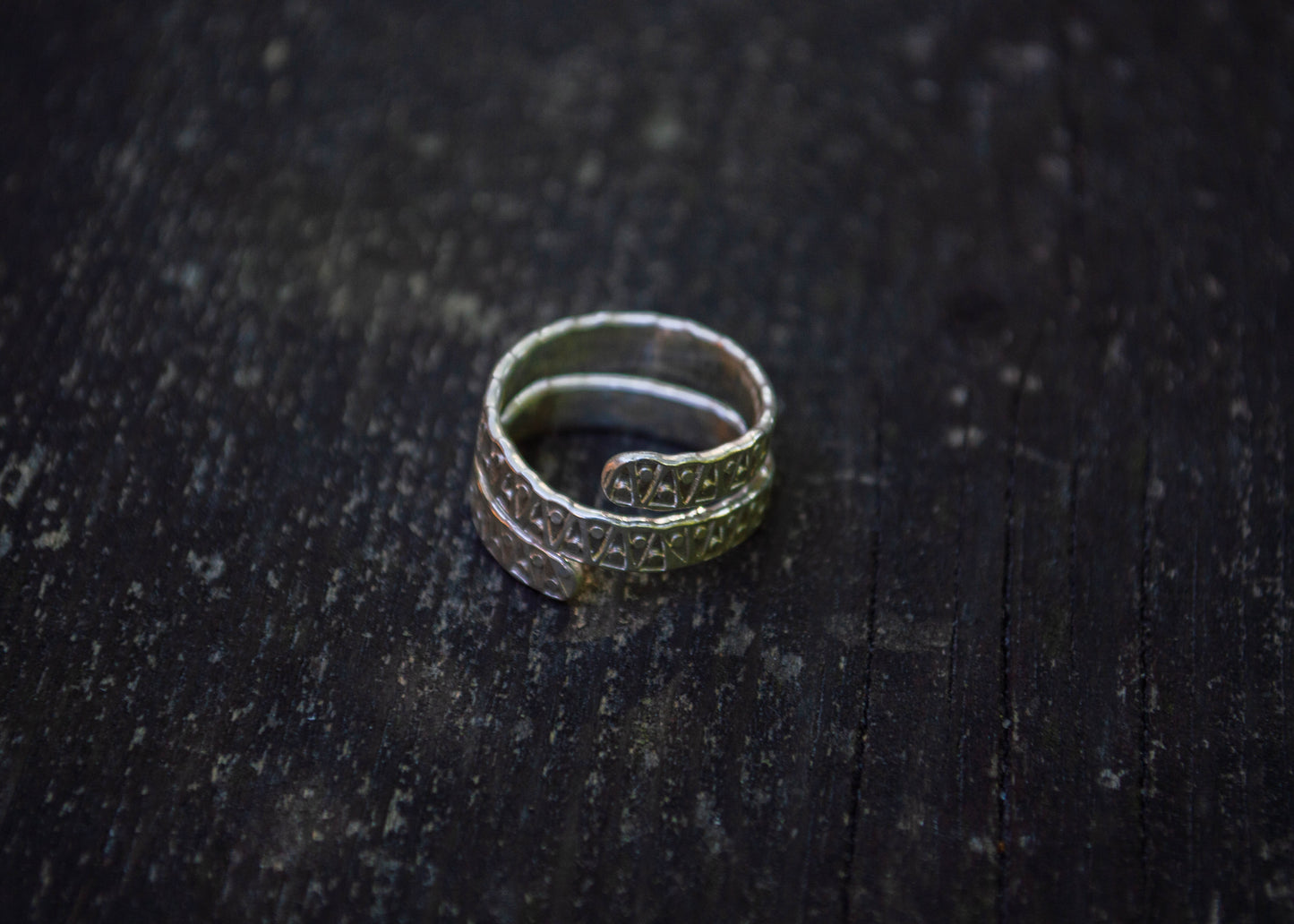 Silver spiral ring with traditional Estonian viking age pattern