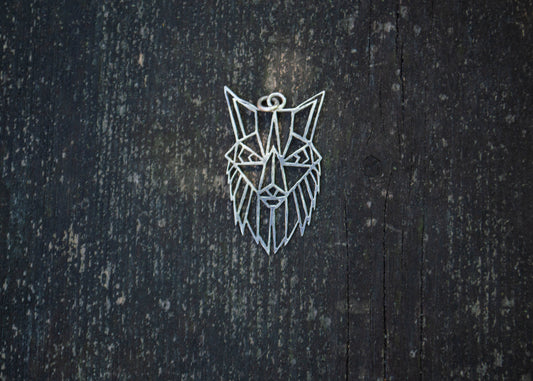 Silver pendant with a fox motif