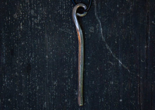 Forged silver pendant