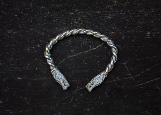 Viking style silver bracelet with sea dragon heads
